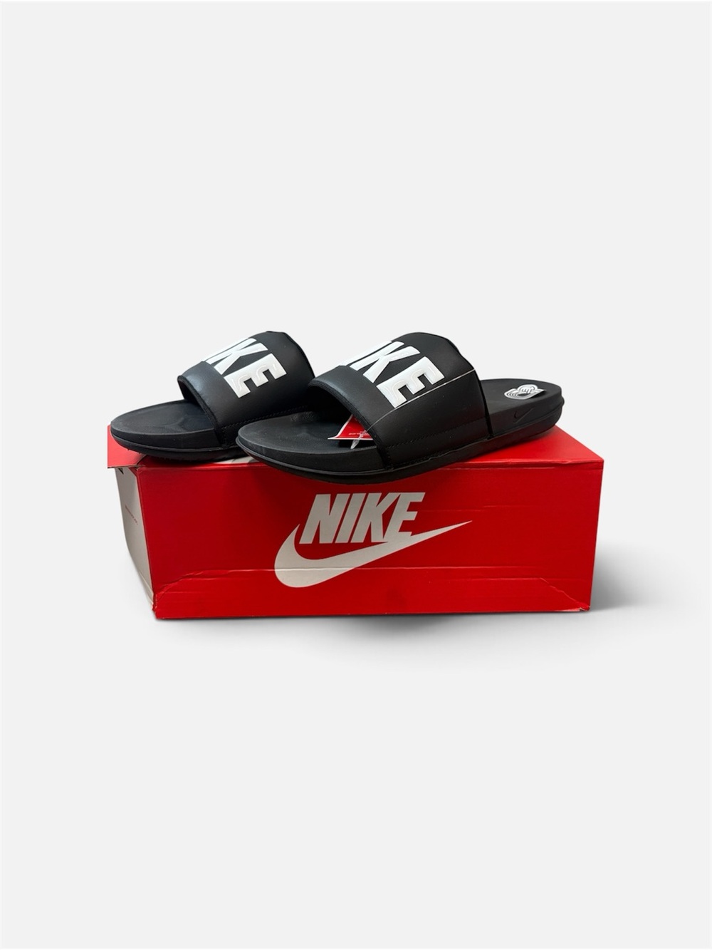Women’s Nike Black Slides with White Logo on Red Box